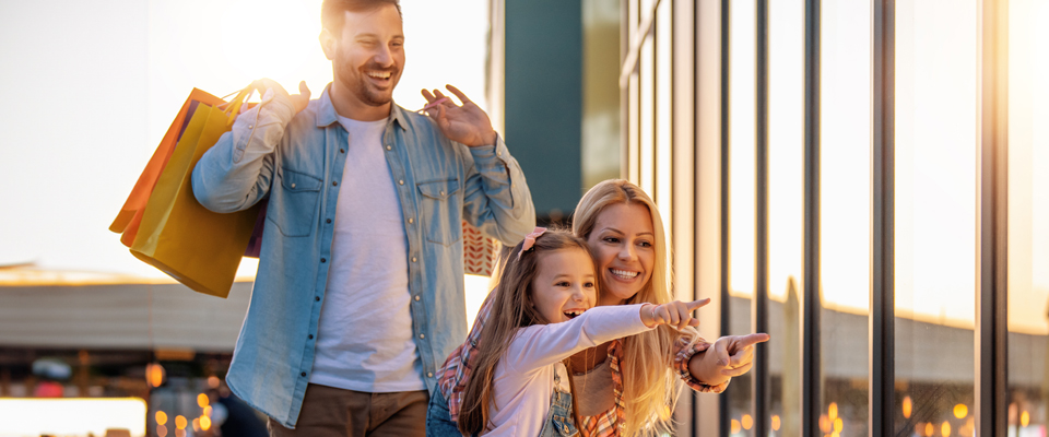 A small family window shopping